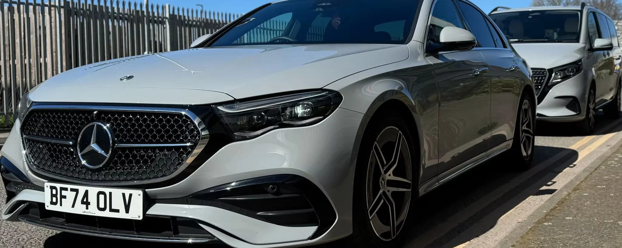 Mercedes-Benz executive saloon and luxury MPV in silver grey