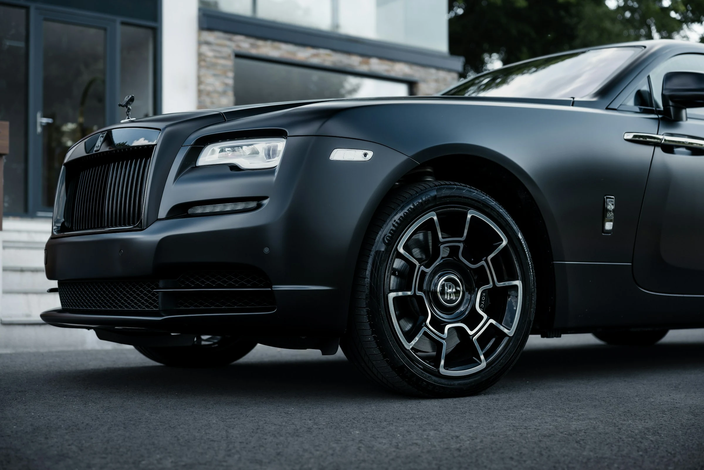 Matte black Rolls-Royce — signature supercar experiences